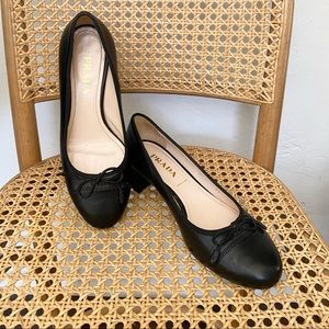 Prada Round Toe Pumps
